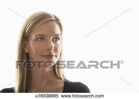 Studio portrait of young woman View Large Photo Image Stock Photography - Studio portrait of young woman. Fotosearch