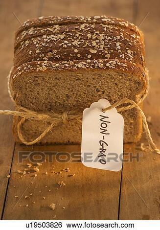 Studio Shot of bread slices tied with string View Large Photo Image Stock Photograph - Studio Shot of bread slices tied with string. Fotosearch