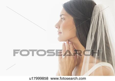 Stock Photo - Studio shot of bride. Fotosearch