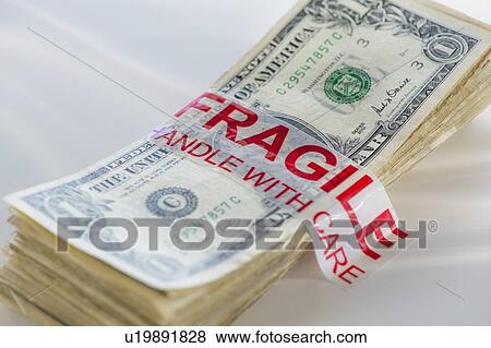 Stock Photo - Studio Shot of bunch of american dollars. Fotosearch