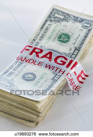 Stock Photograph - Studio Shot of bunch of american dollars. Fotosearch