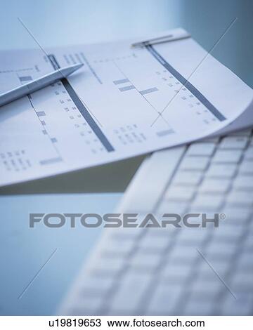 Studio Shot of calculator and paper material View Large Photo Image Stock Image - Studio Shot of calculator and paper material. Fotosearch