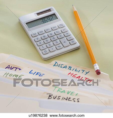 Studio Shot of calculator pen and paper material View Large Photo Image Stock Photo - Studio Shot of calculator pen and paper material. Fotosearch