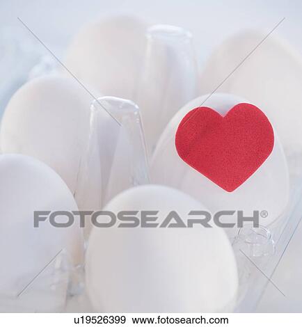 Studio Shot of eggs with red heart View Large Photo Image Stock Photo - Studio Shot of eggs with red heart. Fotosearch
