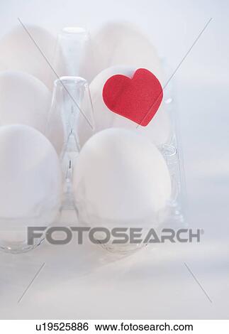 Studio Shot of eggs with red heart View Large Photo Image Stock Photograph - Studio Shot of eggs with red heart. Fotosearch