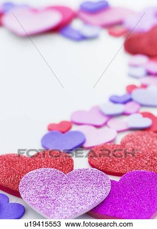 Studio Shot of foam hearts on white background View Large Photo Image Stock Image - Studio Shot of foam hearts on white background. Fotosearch