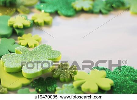 Studio Shot of green foam clovers View Large Photo Image Stock Photography - Studio Shot of green foam clovers. Fotosearch