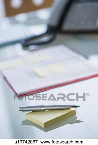 Studio Shot of pen and calendar View Large Photo Image Stock Photo - Studio Shot of pen and calendar. Fotosearch