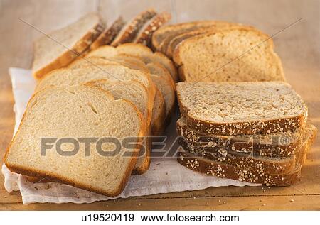 Studio Shot of slices of bread View Large Photo Image Stock Photo - Studio Shot of slices of bread. Fotosearch