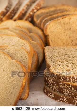 Studio Shot of slices of bread View Large Photo Image Stock Photo - Studio Shot of slices of bread. Fotosearch