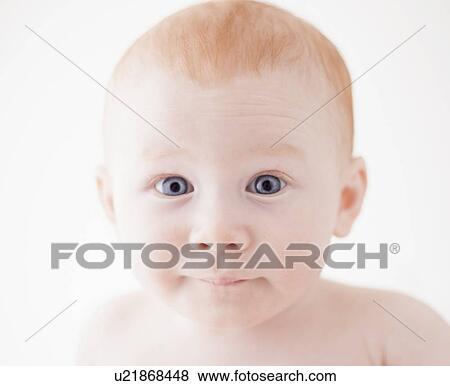 Studio shot portrait of surprised baby boy (18-23 months) View Large Photo Image Stock Photo - Studio shot portrait of surprised baby boy (18-23 months). Fotosearch