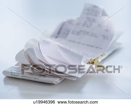 Stock Photograph - Studio Shot, Stack of receipts. Fotosearch