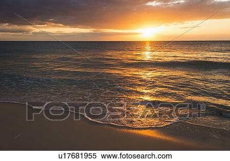 Sun setting over sea View Large Photo Image Stock Photography - Sun setting over sea. Fotosearch
