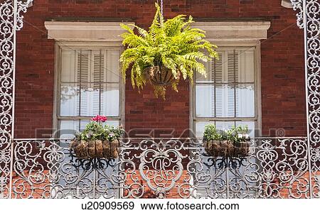 View of building facade and balcony View Large Photo Image Stock Photo - View of building facade and balcony. Fotosearch