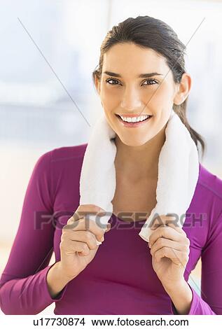 Young woman exercising View Large Photo Image Picture - Young woman exercising. Fotosearch