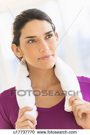 Young woman exercising View Large Photo Image Stock Image - Young woman exercising. Fotosearch