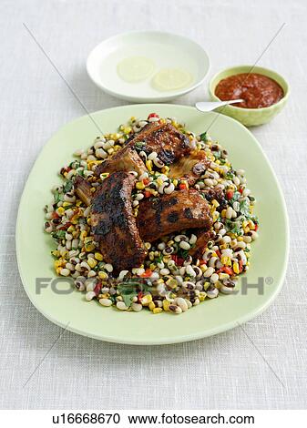 American style pork ribs in barbecue sauce with black eyed beans View Large Photo Image Stock Image - American style pork ribs in barbecue sauce with black eyed beans. Fotosearch