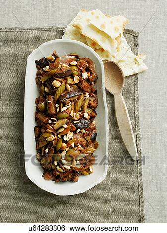 Stock Photograph - Caponata in dish. Fotosearch
