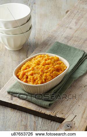 Carrot and swede crush in a white dish on green napkin View Large Photo Image Stock Photograph - Carrot and swede crush in a white dish on green napkin. Fotosearch