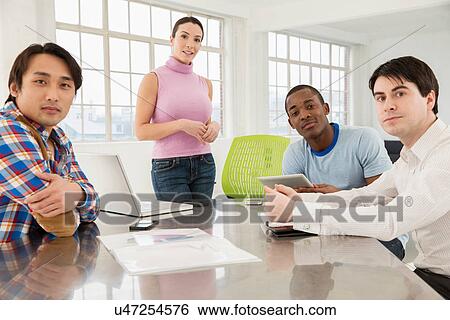 Stock Photograph - Casual business meeting. Fotosearch