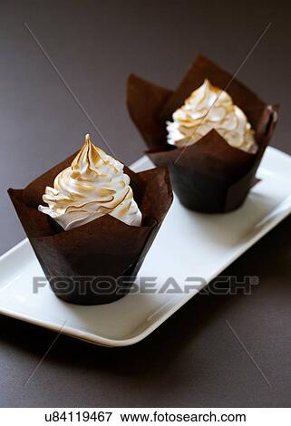 Chocolate muffins with meringue on the top View Large Photo Image Stock Photo - Chocolate muffins with meringue on the top. Fotosearch