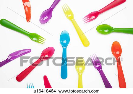 Colourful plastic knives, forks, spoons View Large Photo Image Picture - Colourful plastic knives, forks, spoons. Fotosearch