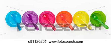 Colourful plastic spoons and bowls in a row View Large Photo Image Stock Photography - Colourful plastic spoons and bowls in a row. Fotosearch