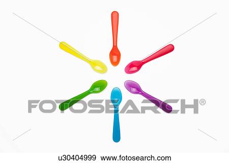 Colourful plastic spoons in a circle View Large Photo Image Stock Photo - Colourful plastic spoons in a circle. Fotosearch