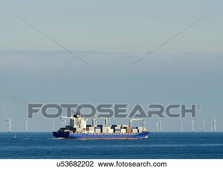 Container ship with windfarm in background, Denmark View Large Photo Image Stock Image - Container ship with windfarm in background, Denmark. Fotosearch