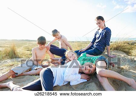 Five children on beach View Large Photo Image Stock Photography - Five children on beach. Fotosearch