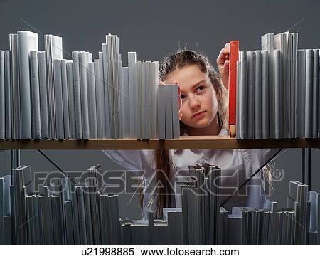Girl choosing red book from bookshelf View Large Photo Image Stock Photography - Girl choosing red book from bookshelf. Fotosearch