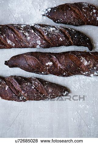 Homemade baguette with malt View Large Photo Image Stock Photo - Homemade baguette with malt. Fotosearch