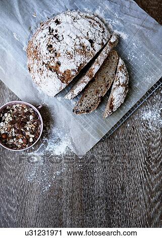 Homemade bread with muesli View Large Photo Image Stock Image - Homemade bread with muesli. Fotosearch
