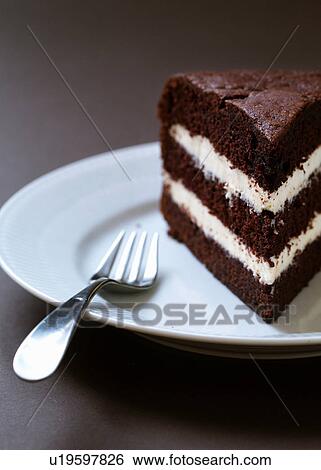 Homemade layered chocolate cake View Large Photo Image Stock Photograph - Homemade layered chocolate cake. Fotosearch