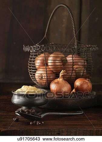 Stock Image - Ingredients for beef and mustard sausages. Onions, mustard and black peppercorns. Fotosearch