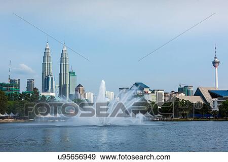 Kuala Lumpur cityscape including Petronas Twin Towers over Titiwangsa Lake, Malaysia View Large Photo Image Stock Photo - Kuala Lumpur cityscape including Petronas Twin Towers over Titiwangsa Lake, Malaysia. Fotosearch