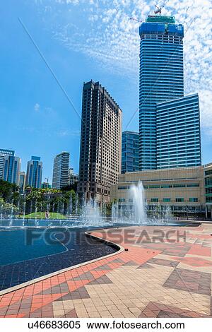 Stock Photography - Kuala Lumpur skyscrapers and Lake Symphony, Malaysia. Fotosearch