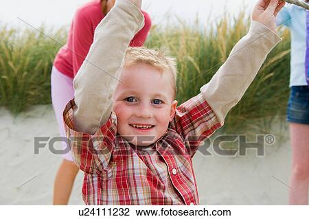 Little boy on holiday View Large Photo Image Stock Image - Little boy on holiday. Fotosearch