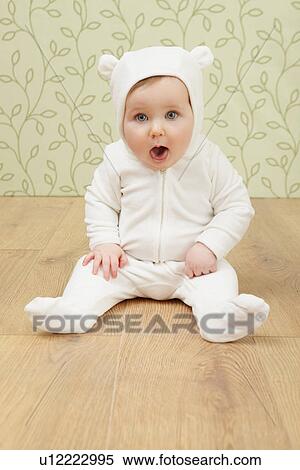 Little girl in babygro with ears View Large Photo Image Stock Photography - Little girl in babygro with ears. Fotosearch