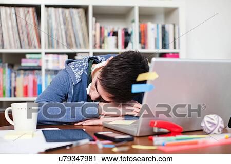 Male Student Asleep At Desk Stock Image U79347981 Fotosearch