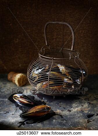 Stock Photo - Mussels in basket. Fotosearch
