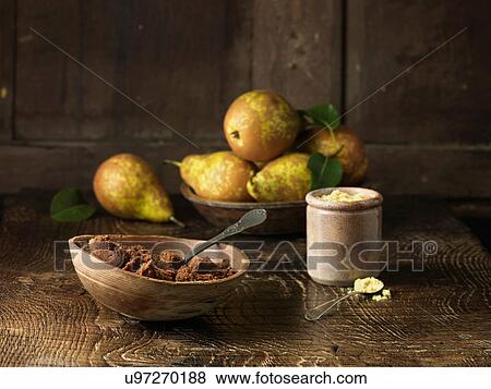 Pears and spiced muscovado sugar and molasses on rustic wooden surface View Large Photo Image Stock Photo - Pears and spiced muscovado sugar and molasses on rustic wooden surface. Fotosearch