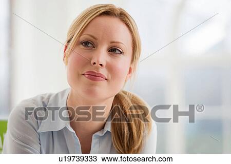 Stock Image - Portrait of blonde businesswoman. Fotosearch