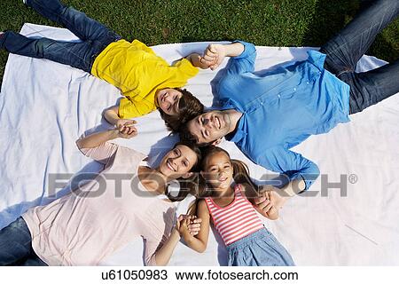 Portrait of family with two children from overhead View Large Photo Image Stock Image - Portrait of family with two children from overhead. Fotosearch