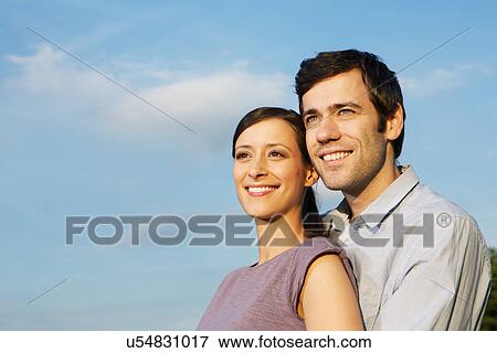 Portrait of mid adult couple, looking away View Large Photo Image Stock Photo - Portrait of mid adult couple, looking away. Fotosearch