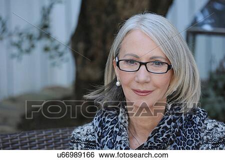Portrait of senior woman wearing spectacles View Large Photo Image Stock Photograph - Portrait of senior woman wearing spectacles. Fotosearch