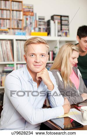 Portrait of students studying View Large Photo Image Picture - Portrait of students studying. Fotosearch