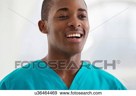 Portrait of young man wearing surgical scrubs View Large Photo Image Stock Photo - Portrait of young man wearing surgical scrubs. Fotosearch