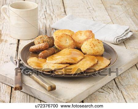 Roast turkey meal for one. Slices of roast turkey with sausages, stuffing and roast potatoes and gravy View Large Photo Image Stock Image - Roast turkey meal for one. Slices of roast turkey with sausages, stuffing and roast potatoes and gravy. Fotosearch