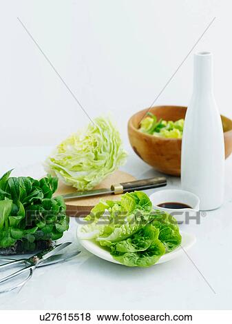 Selection of lettuces with balsamic vinegar and olive oil View Large Photo Image Stock Photo - Selection of lettuces with balsamic vinegar and olive oil. Fotosearch